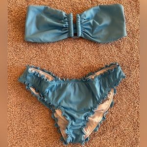 Blue Victoria secret bikini. NEVER worn! Strapless and really comfortable.